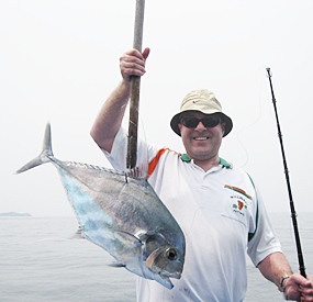 Andy Mennuir with his catch of the day.